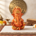Divine Orange Ganesha Idol for Prosperity and Peace